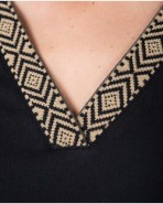 Women's short dress with ethnic detail at the neckline